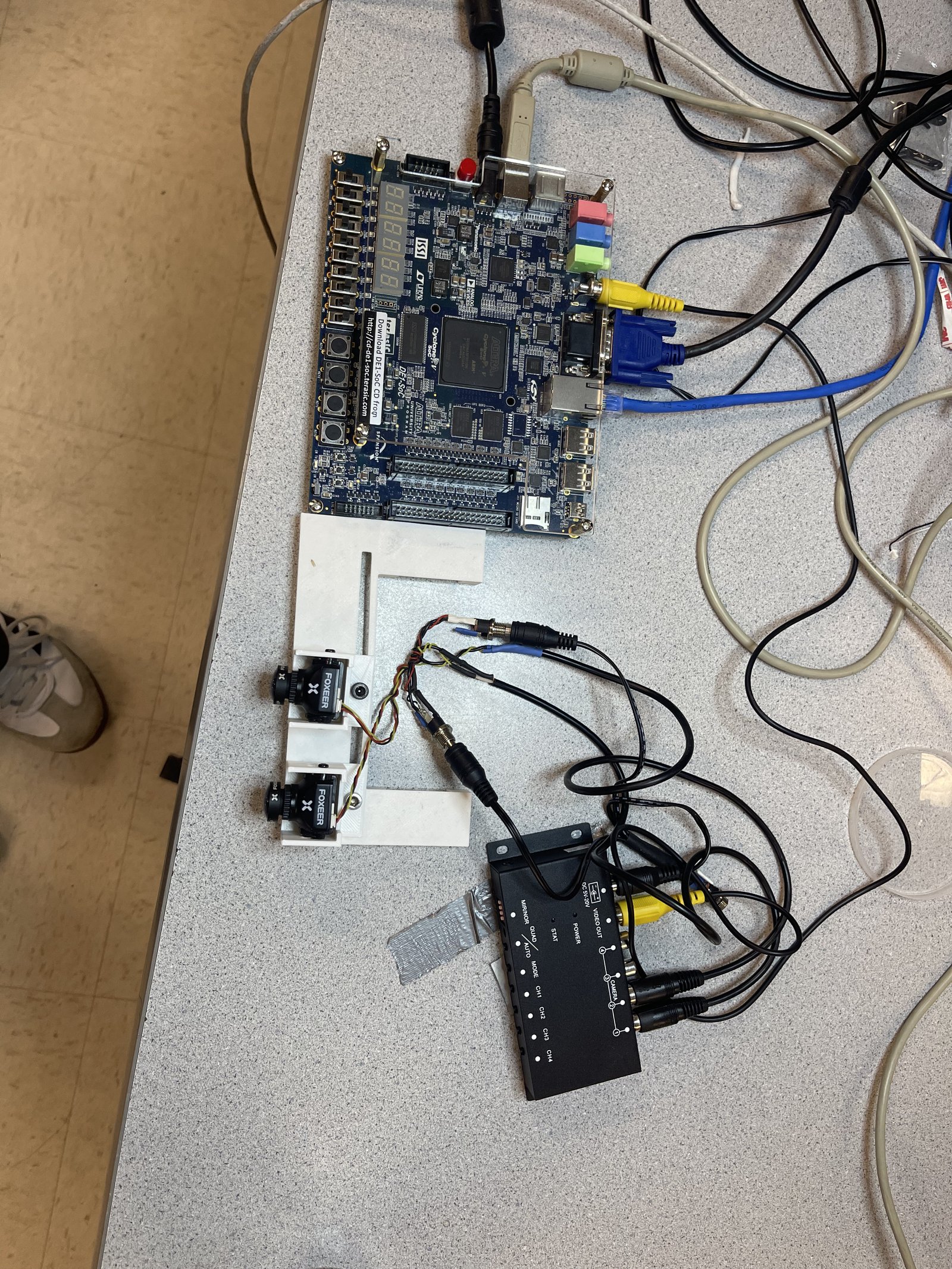 DE1-SoC board with dual-camera stereo rig and AV switcher